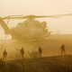 Illustration for article titled US Marines leaving a Super Stallion helicopter looks like a movie scene